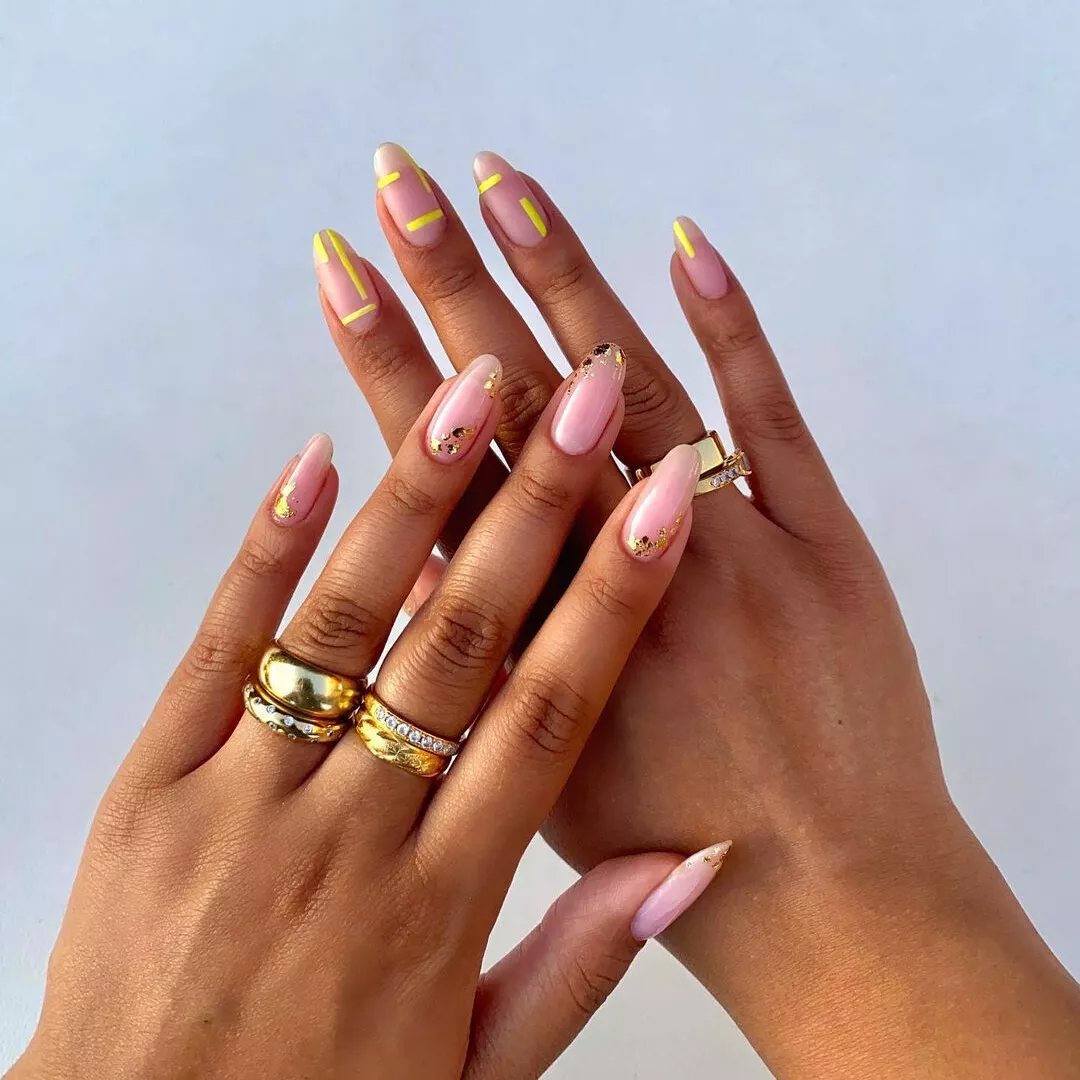 golden, mismatched nails
