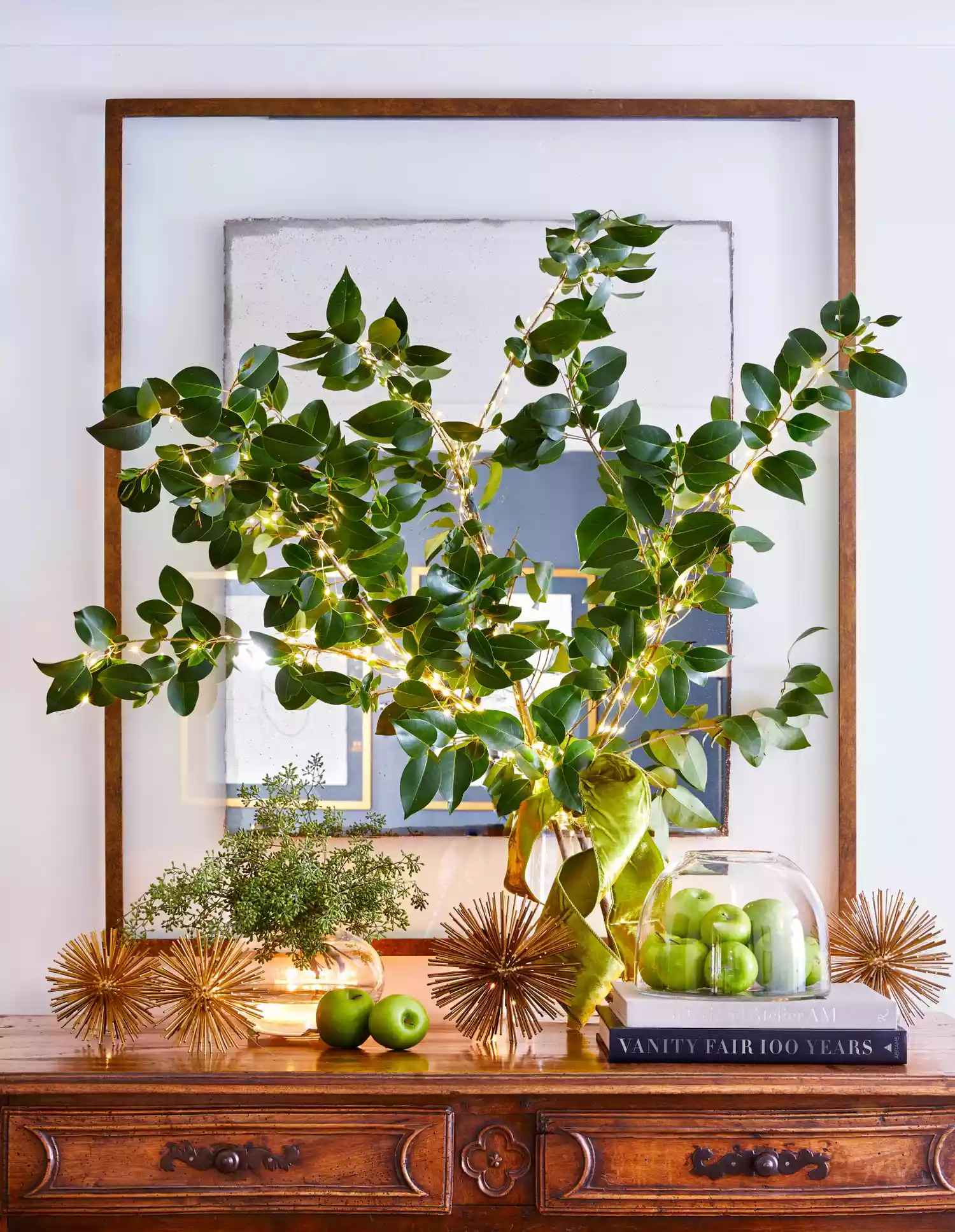 Camellia Branches in Clear Vase with Green Ribbon