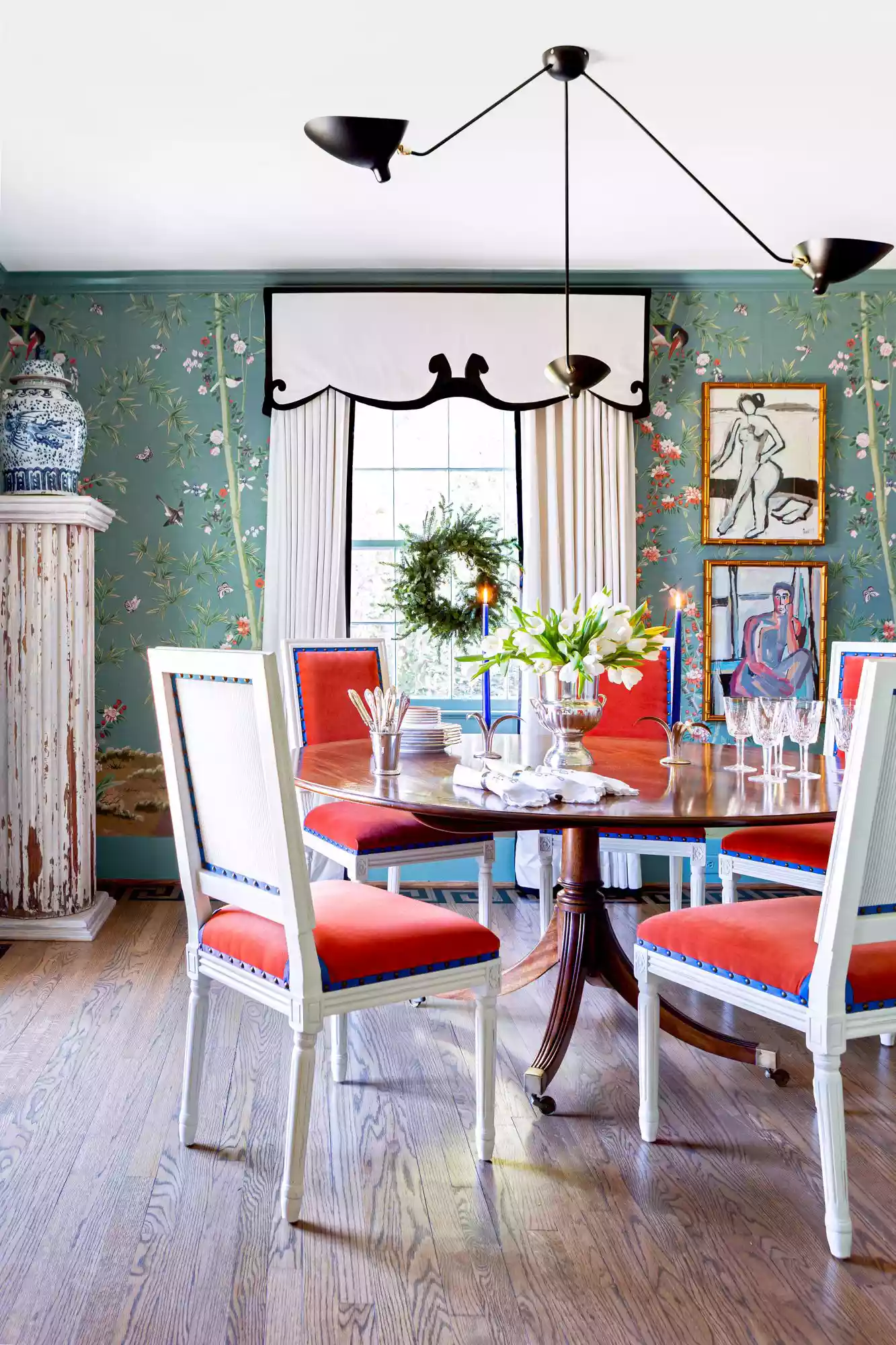 Formal Dining Room with Green Wallpaper and Pops of Blue and Salmon