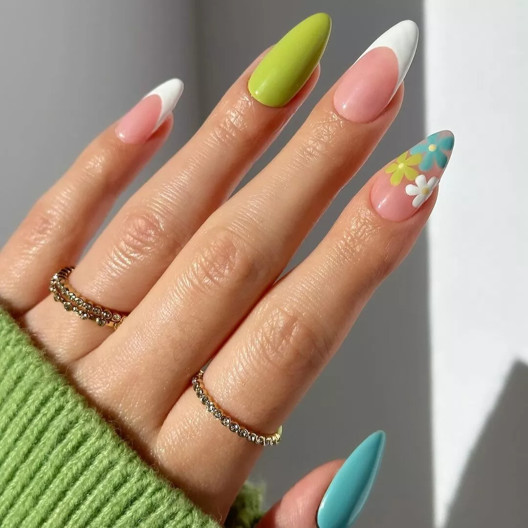 French tips with two floral accent nails