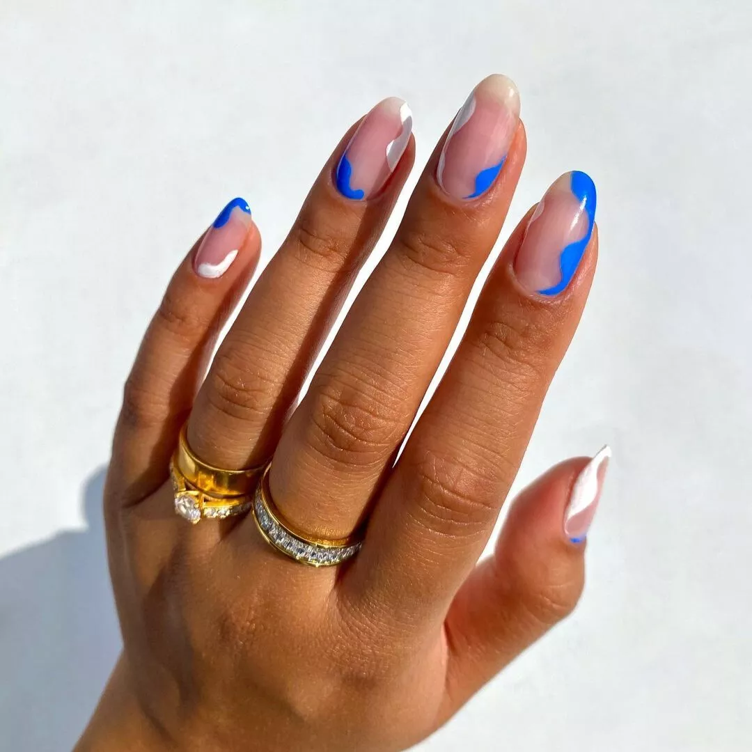 Blue wavy nails with lots of negative space