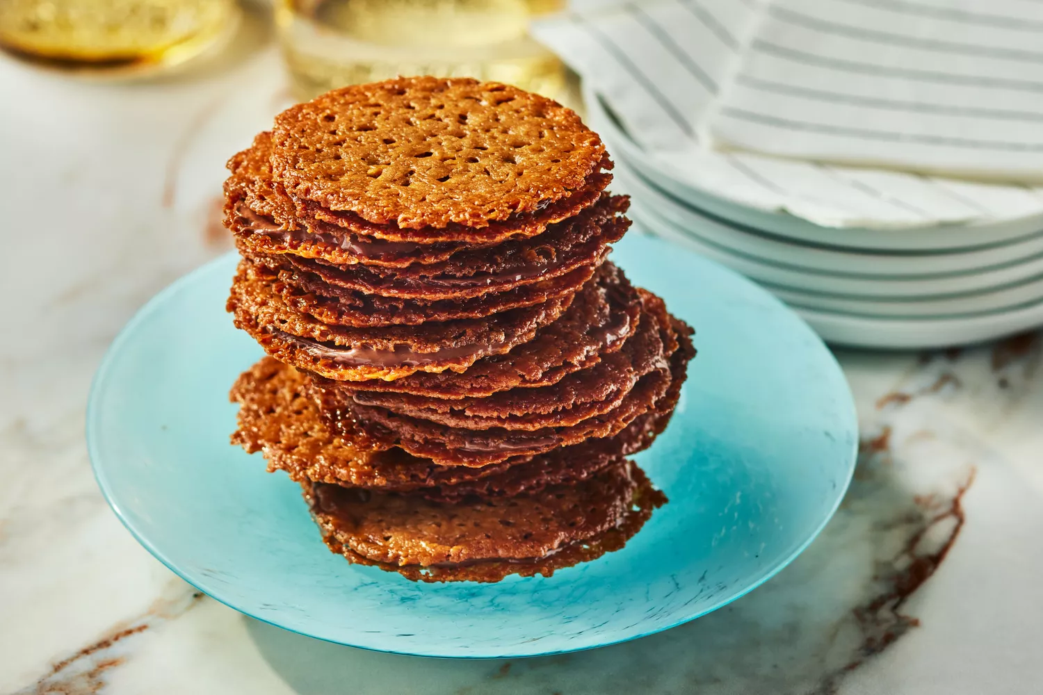Southern Living Lace Cookies stacked on a plate to serve