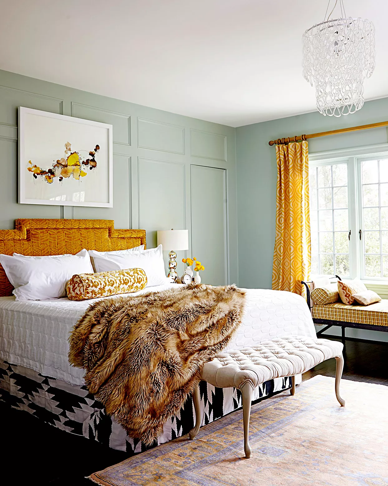 Bed with fur throw blanket