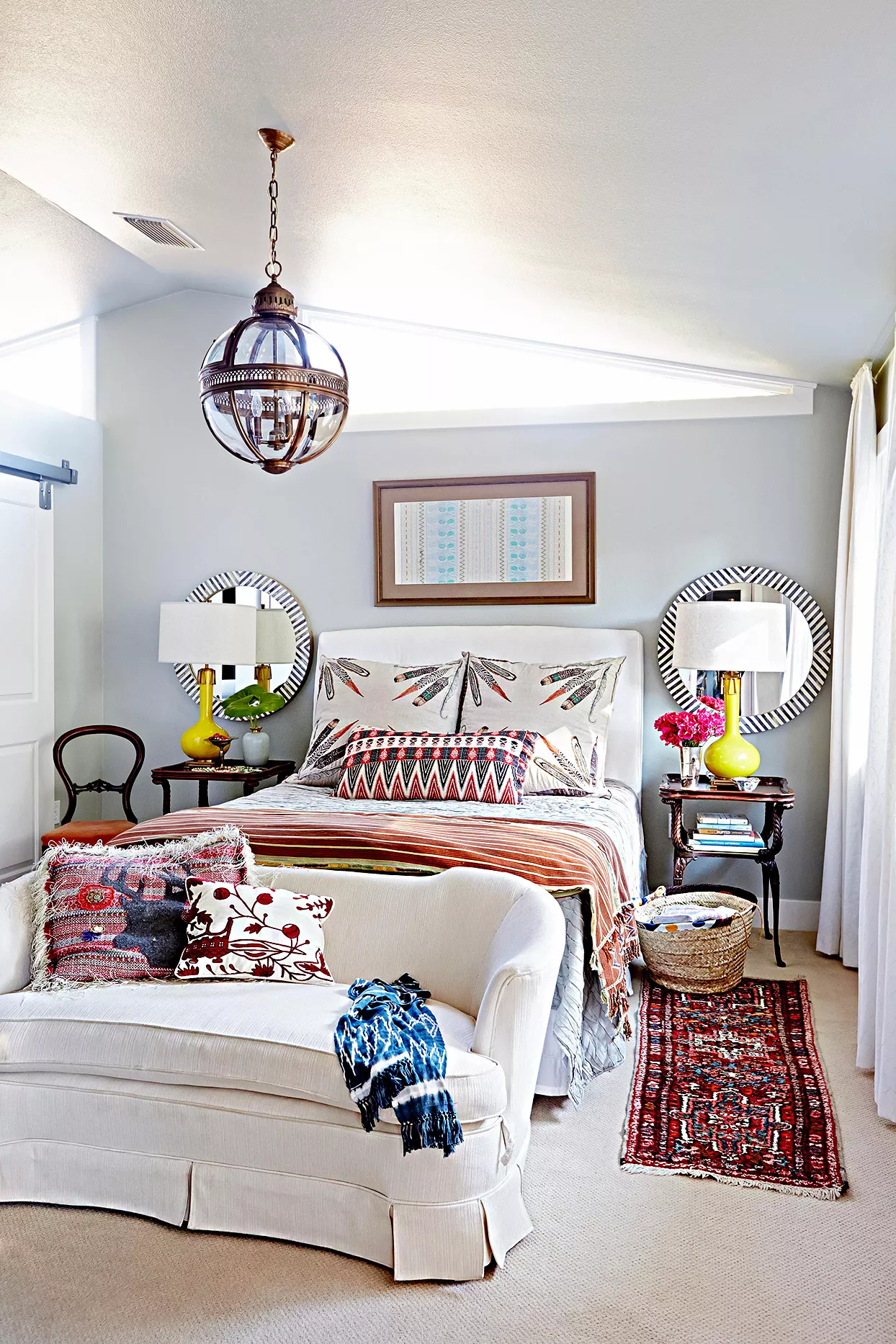 Bedroom with couch and pillows