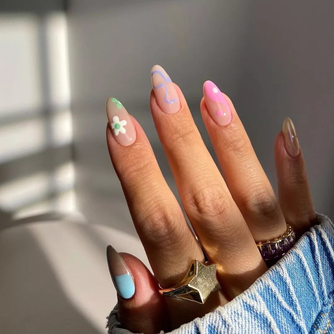 Pastel nails with mismatched designs