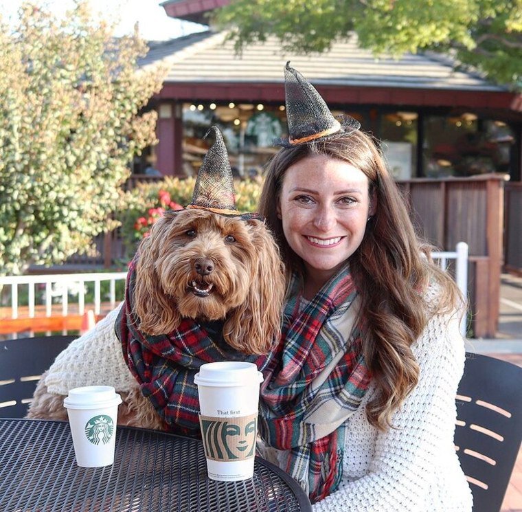 woman and dog dressed like two basic witches