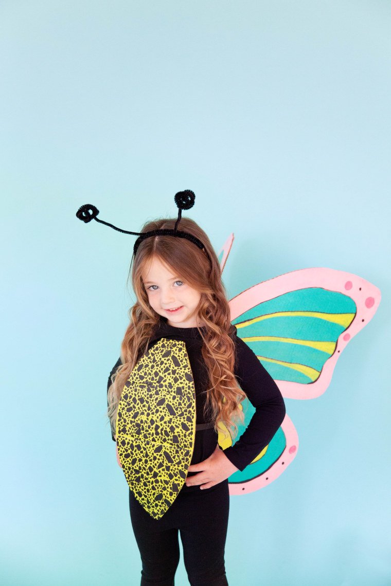 little girl in a diy butterfly costume