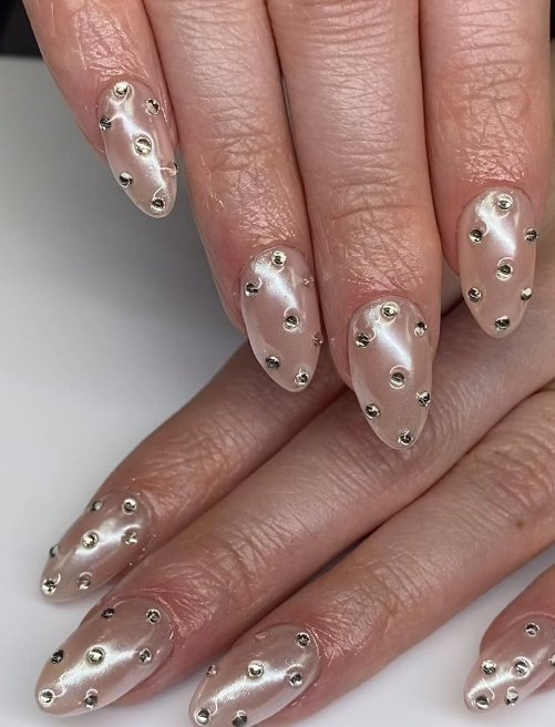 short chrome stiletto nails with gems