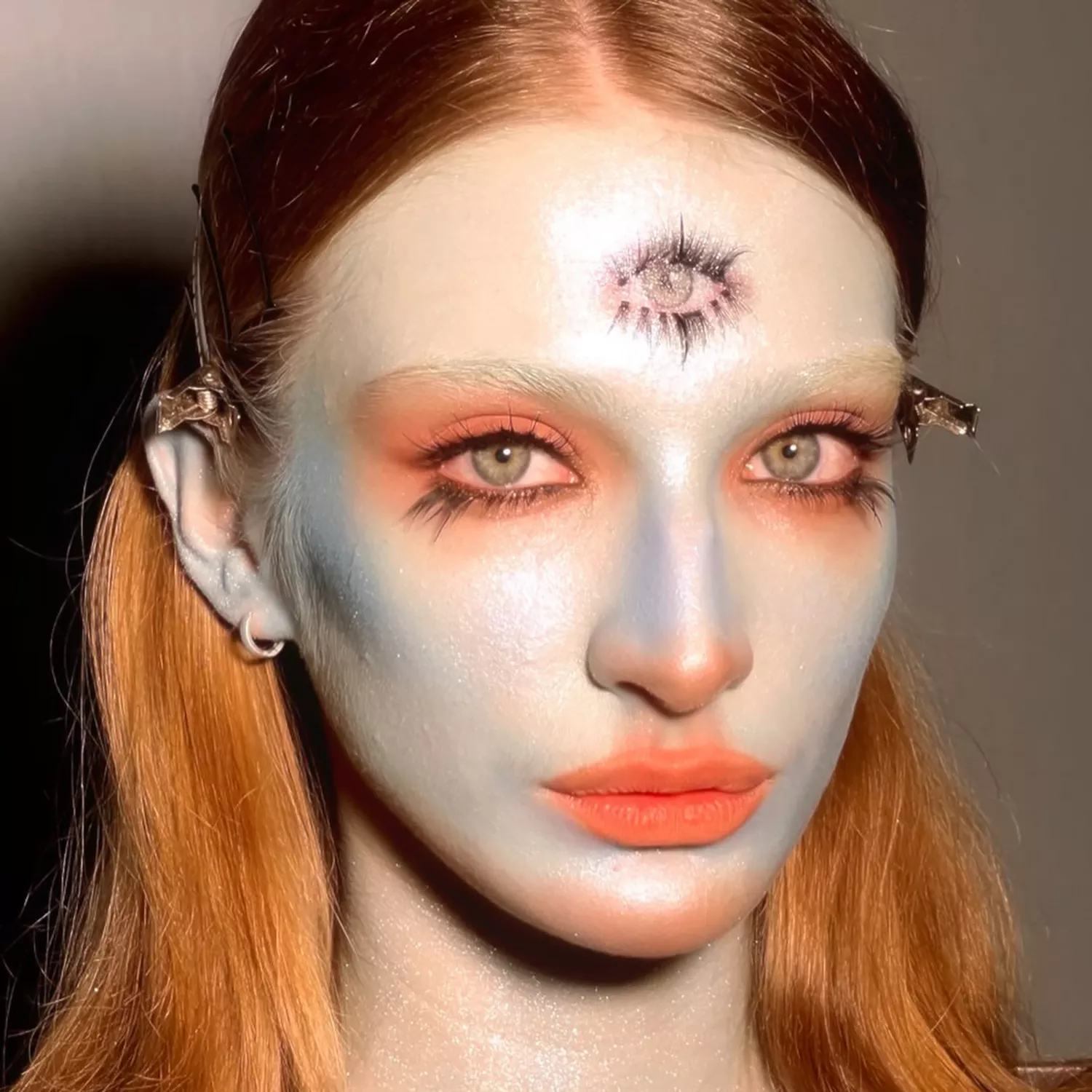 Pale blue third eye makeup design