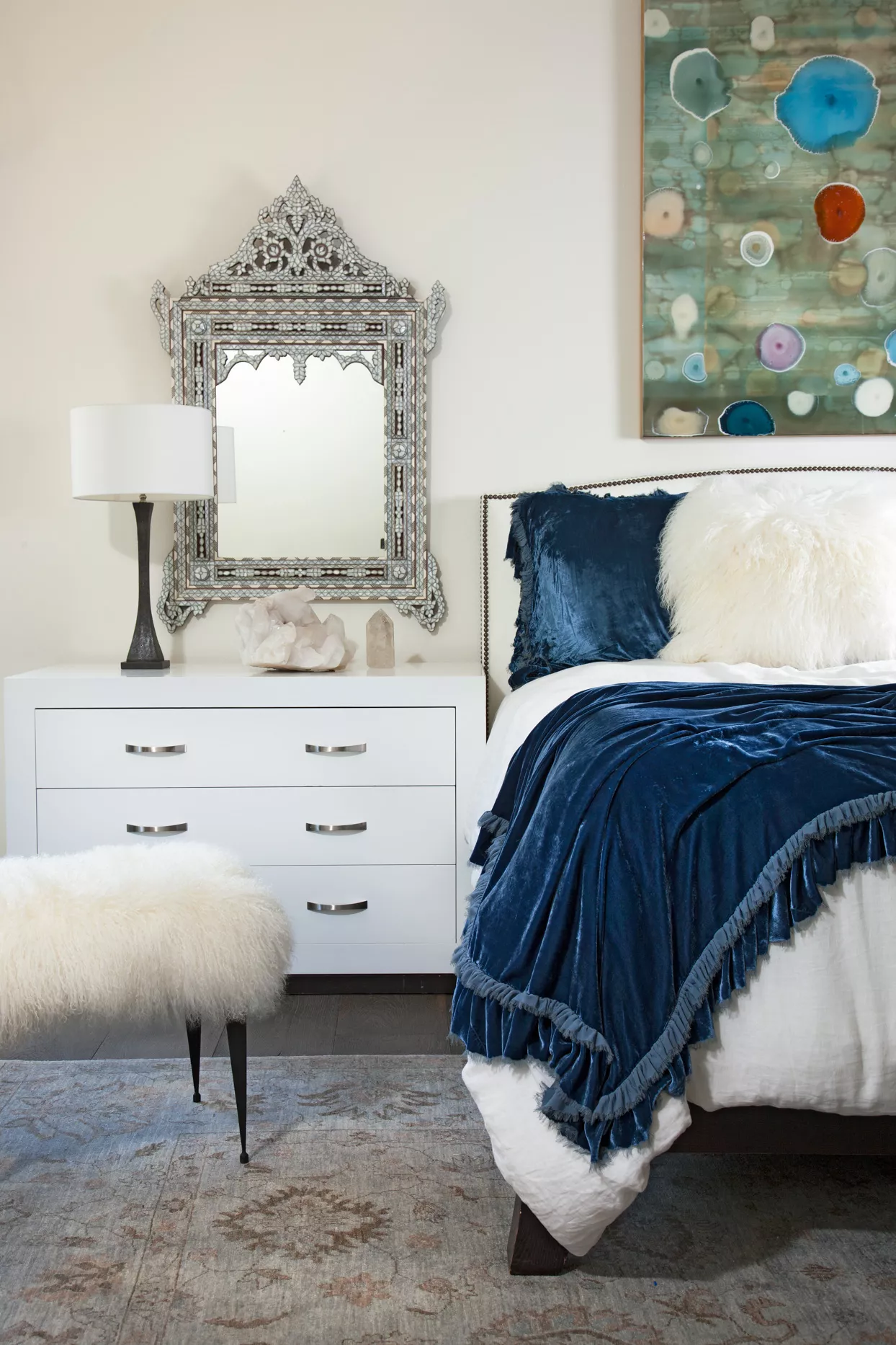 bedroom white bedding dark blue accents