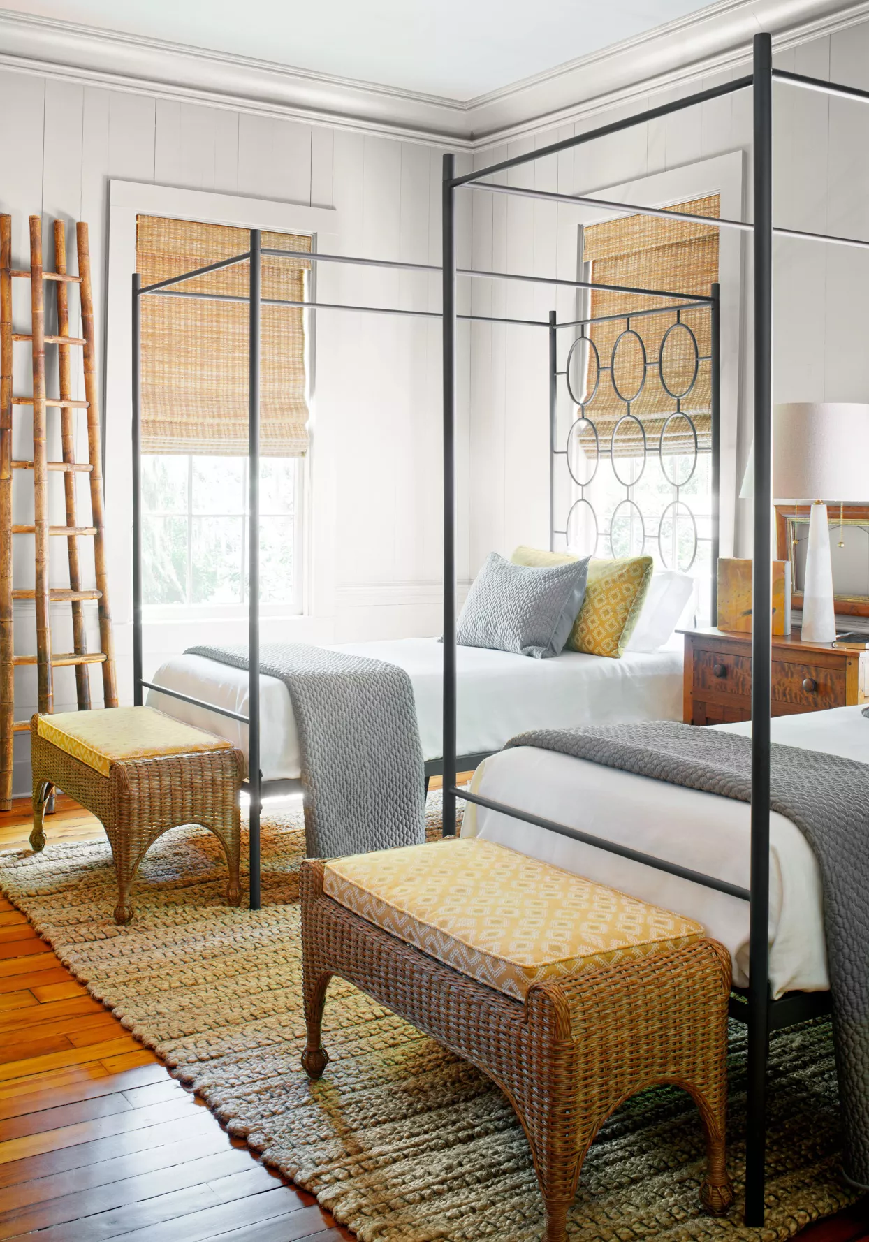 Twin canopy beds in bedroom