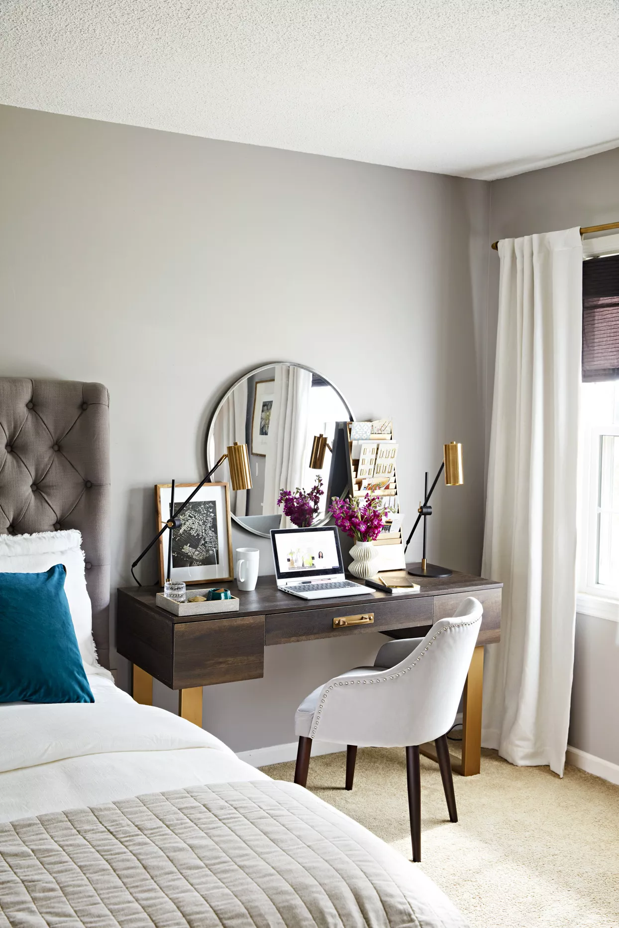 work desk with gold accents in bedroom